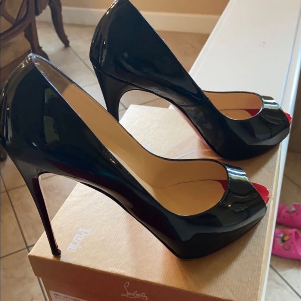 Authentic Christian Louboutin peep toe pumps